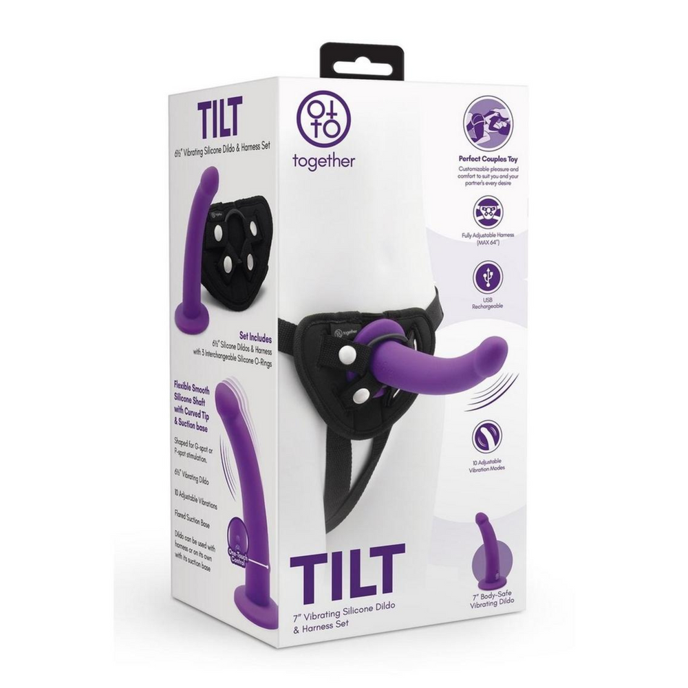 view of Together Toys TILT Vibrating 6.5 Inch Dildo and Harness Set as seen inside of packaging