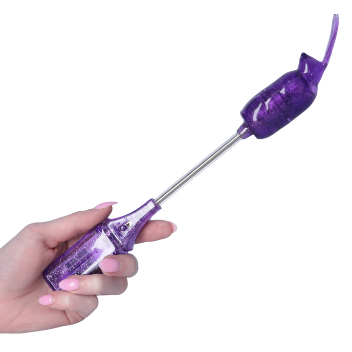 hand holding purple Rabbit Wiggle Wand 
