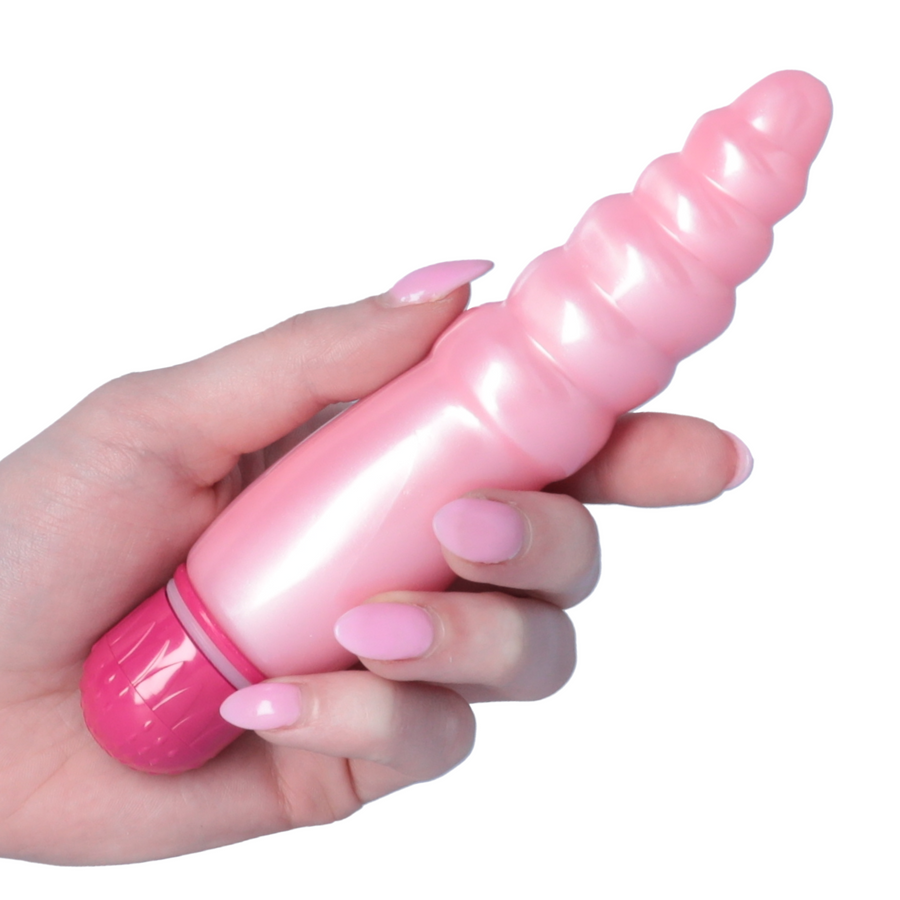 hand holding ripple bliss top cat vibrator 