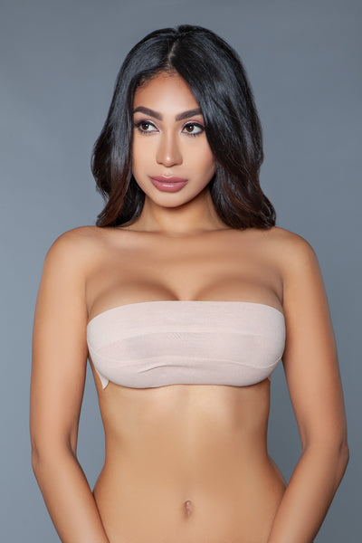 Beige breast adhesive on model