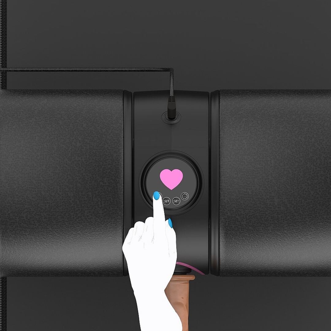 hand pressing power button on Sit and Thrust Automatic Sex Machine