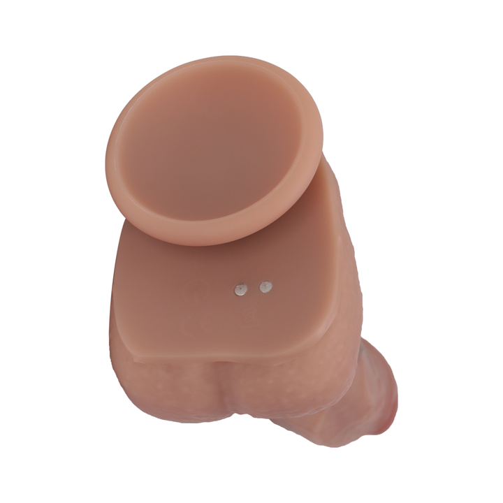 charging base from Hot Shot Heated Thrusting and Vibrating Dildo 