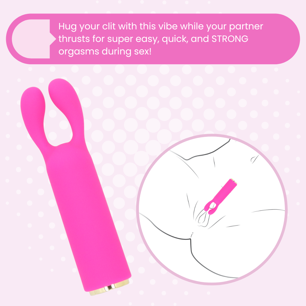 Pink clitoral stimulator with text on a pink background. Hug your clit with this vibe while your partner thrusts for super easy, quick, and STRONG orgasms during sex!