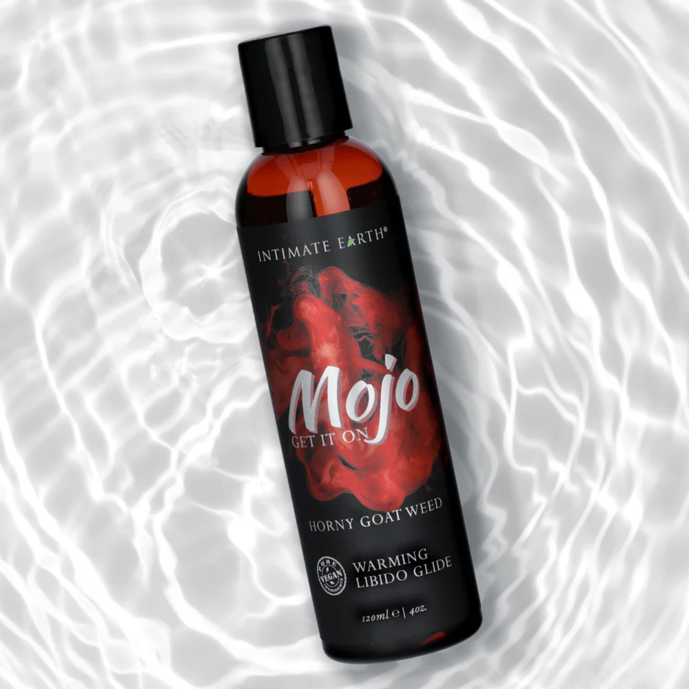 MOJO Horny Goat Weed Libido Warming Glide Lubricant 4oz with water in background 