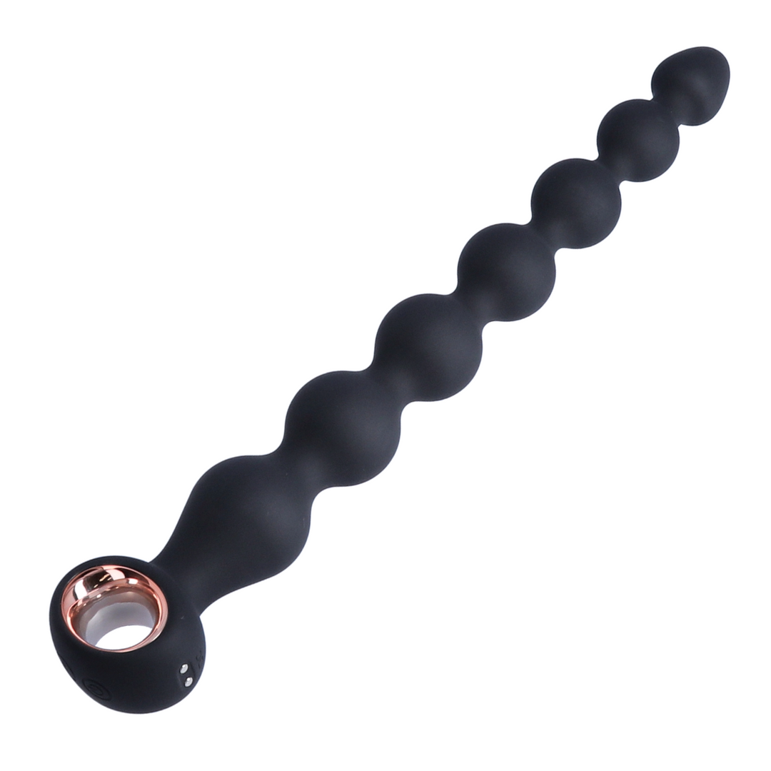angled view of large black anal beads with magnetic charging 