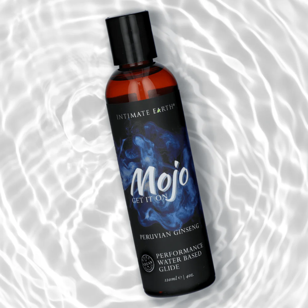 MOJO Peruvian Ginseng Water Based Performance Glide Lubricant with water in the background 