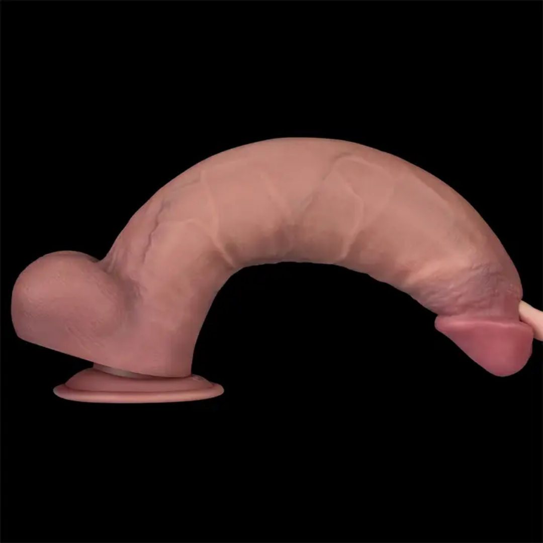 hand bending 12 inch Vibrating Dual Density Power Cock by LoveToy to show flexibility 