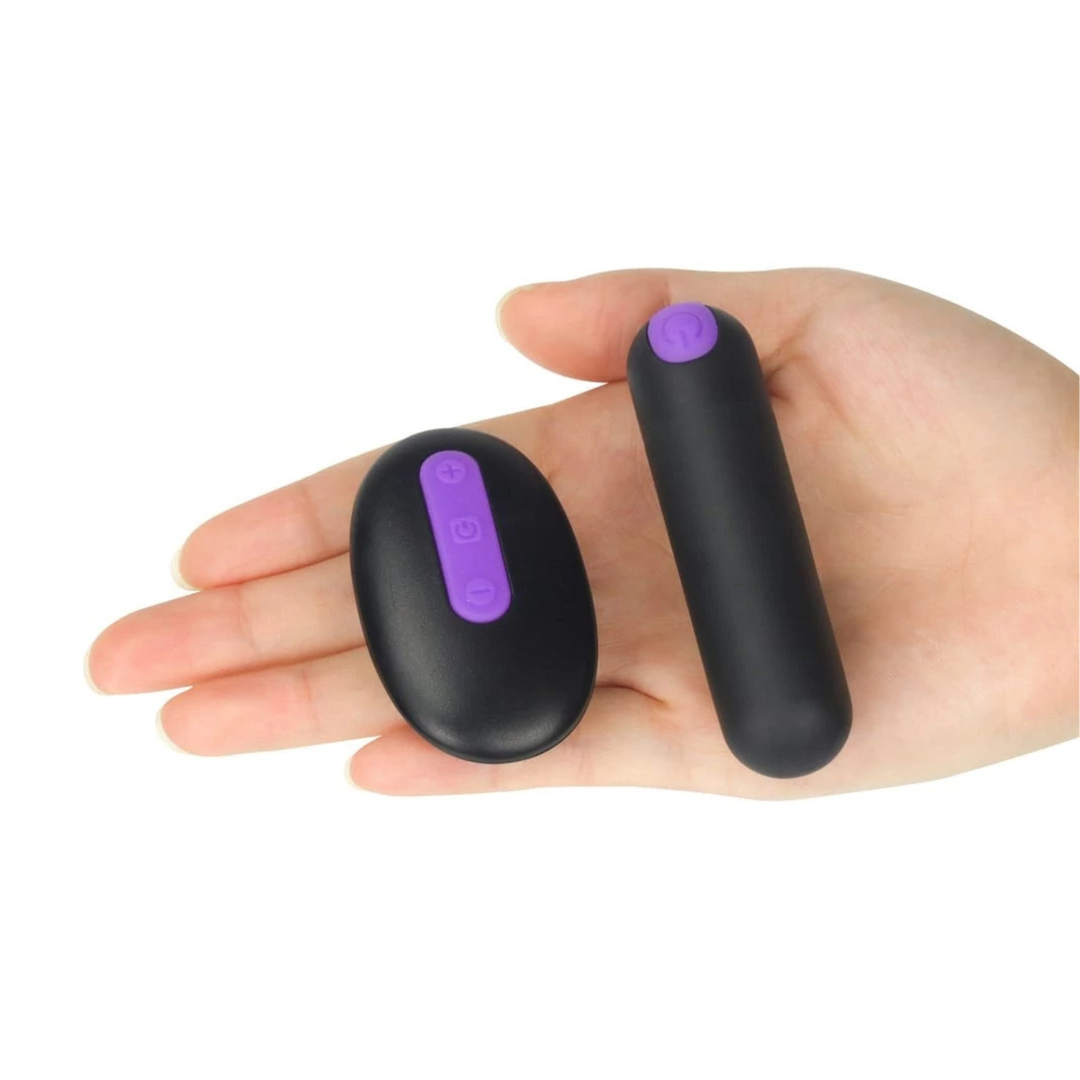 hand holding bullet vibrator and remote from INGEN Bitch Vibrating Panties