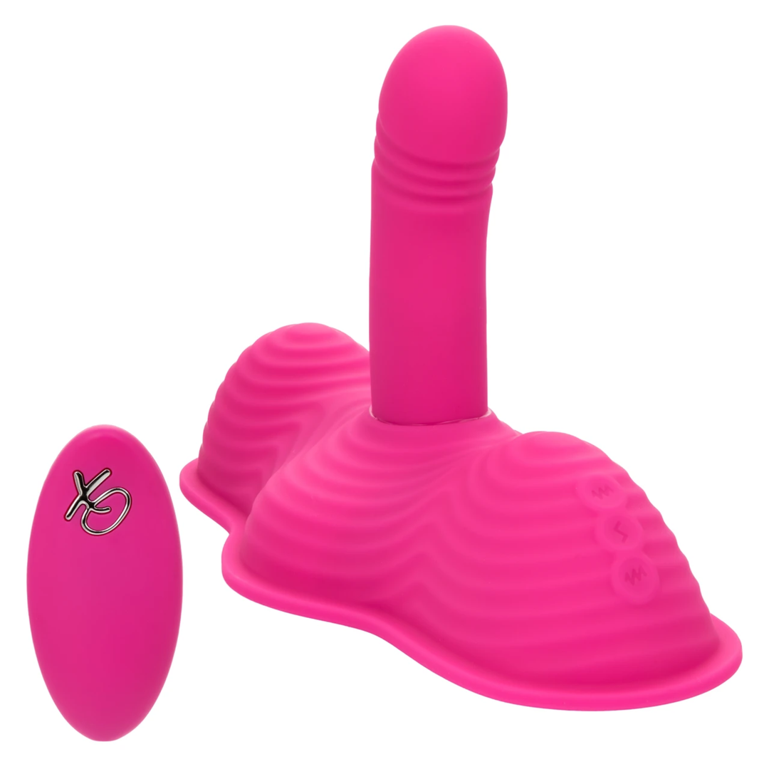 wireless remote as seen next to Calexotics Triple Rider Remote Control Ecstasy Rumbler Rechargeable Silicone Vibrator 