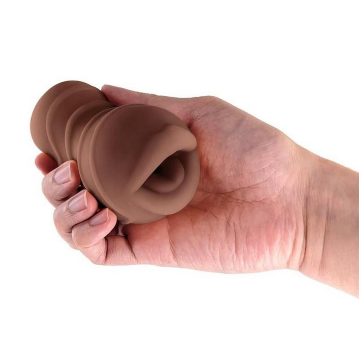 hand holding Pocket Pals Stroker 