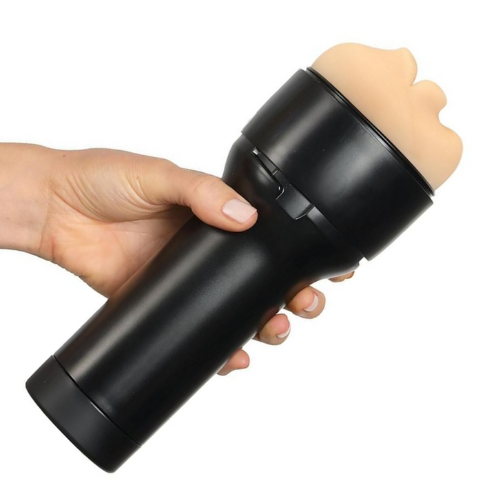 hand holding Kiiroo Feel Generic Mouth Masturbator - Vanilla
