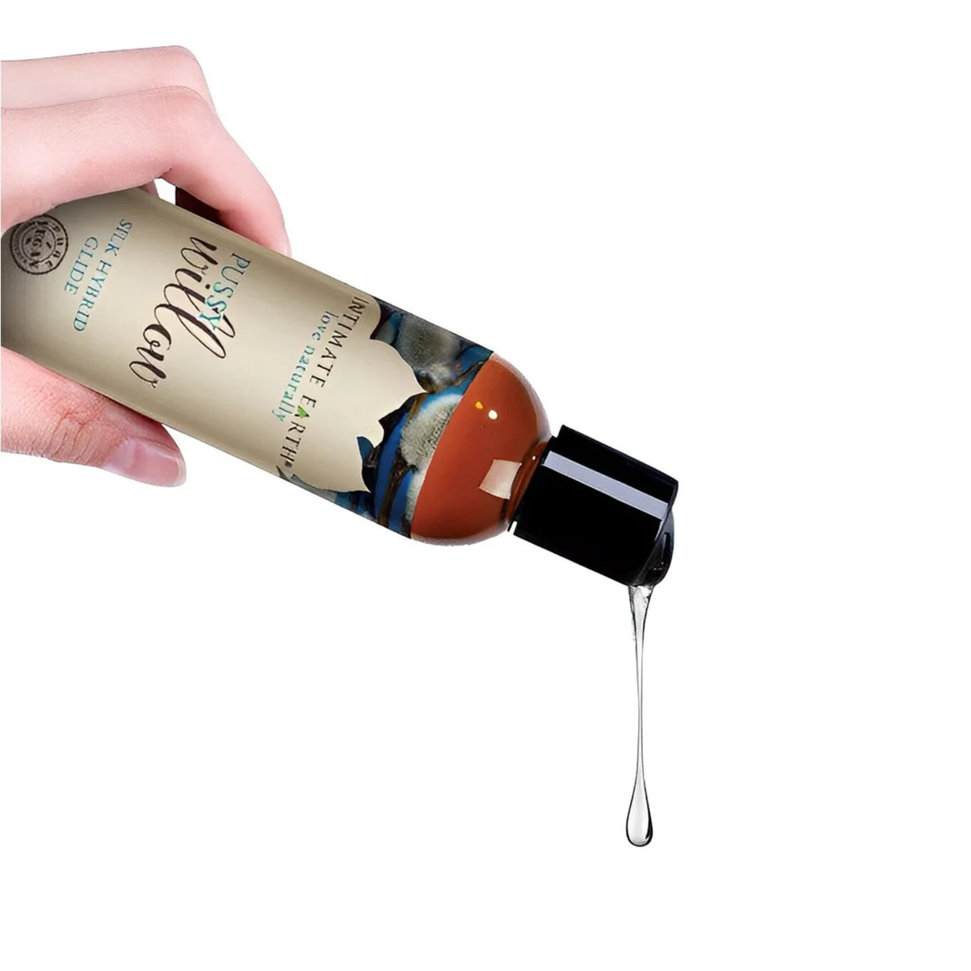 hand pouring Intimate Earth Pussy Willow Silk Hybrid Glide Lubricant 