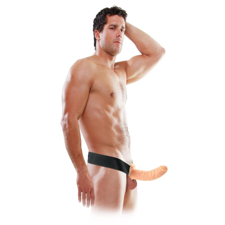 man wearing Fetish Fantasy Series Hollow Strap-On Dildo and Adjustable Harness 8in 