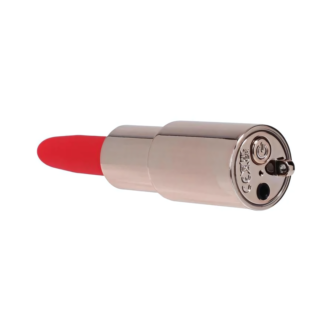 view of power button from Loveline Candy Lipstick Rechargeable Silicone Vibrator with Interchangeable Heads