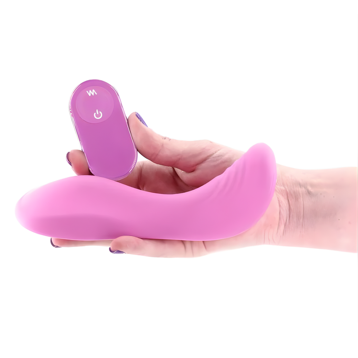 hand holding Grinders Rocker Rechargeable Silicone Vibrating Dual Motor Pad with Remote 