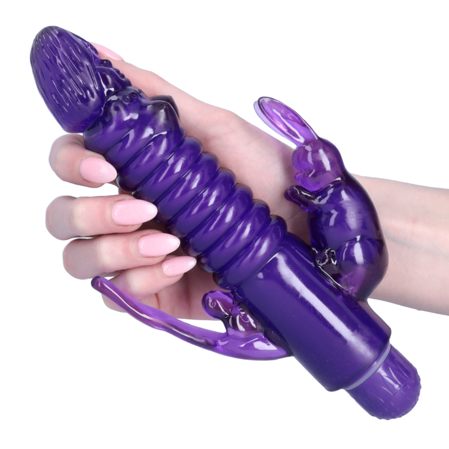 hand holding purple triple stimulator rabbit 