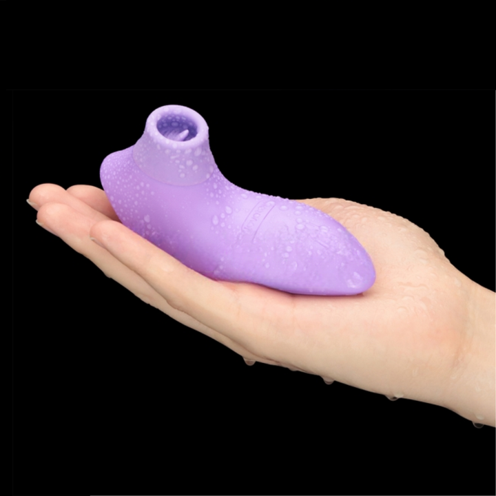 hand holding Flicker Rechargeable Clitoral Stimulator