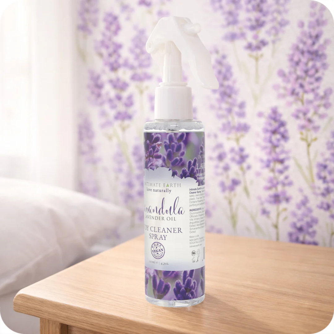 Lavandula Toy Cleaner Spray 4.2oz as seen in a bedroom with lavender in the background 