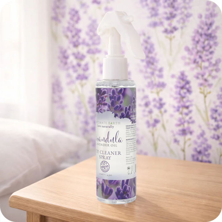Lavandula Toy Cleaner Spray 4.2oz as seen in a bedroom with lavender in the background 