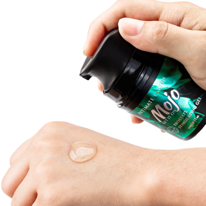 hand pumping MOJO Niacin and Yohimbe Prostate Stimulating Gel Lubricant 1oz onto top of hand 
