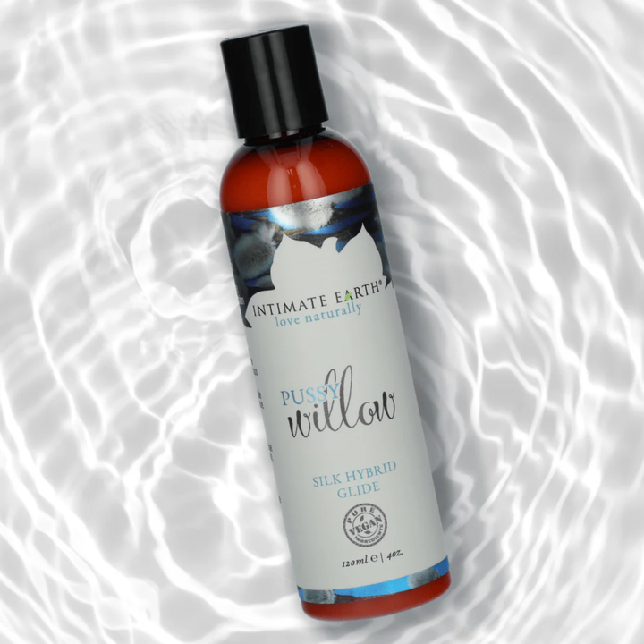 Intimate Earth Pussy Willow Silk Hybrid Glide Lubricant 4 ounces water background 