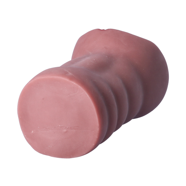 angled view of bottom of brown realistic pocket pussy ribbed exterior 