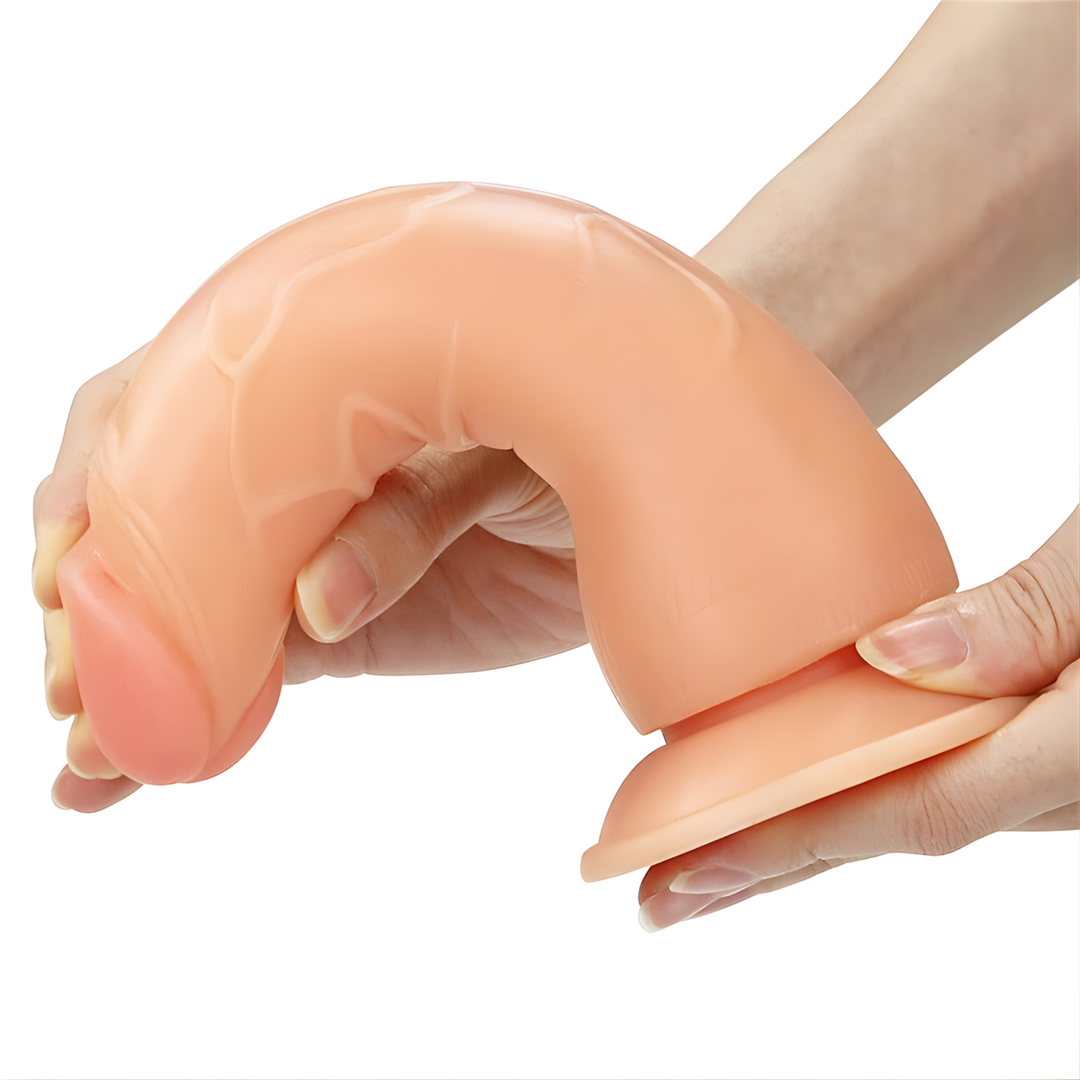 hands bending dildo from INGEN 7.5 Inch Easy Strapon Set