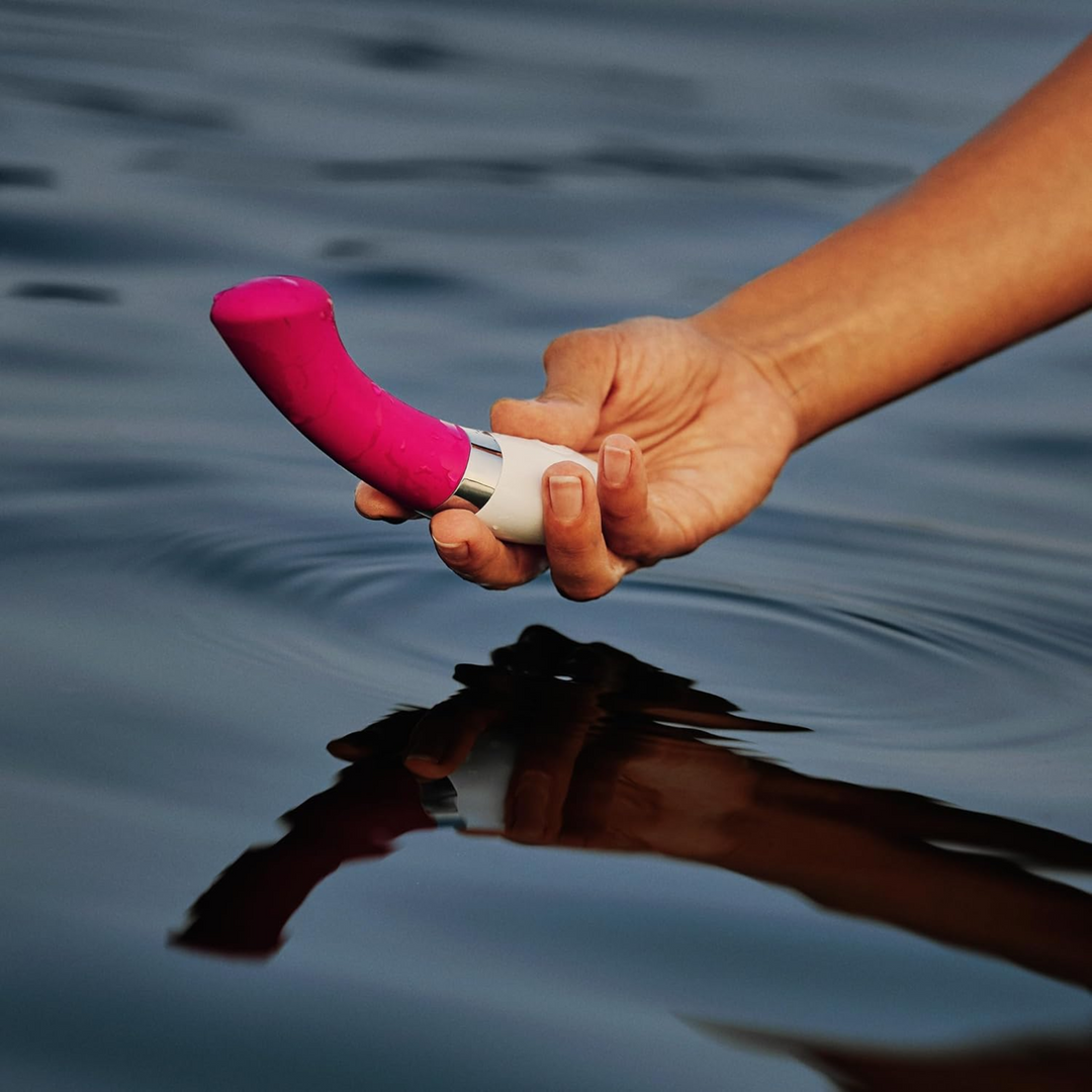 hand holding the Gigi 2 in deep rose from LELO 