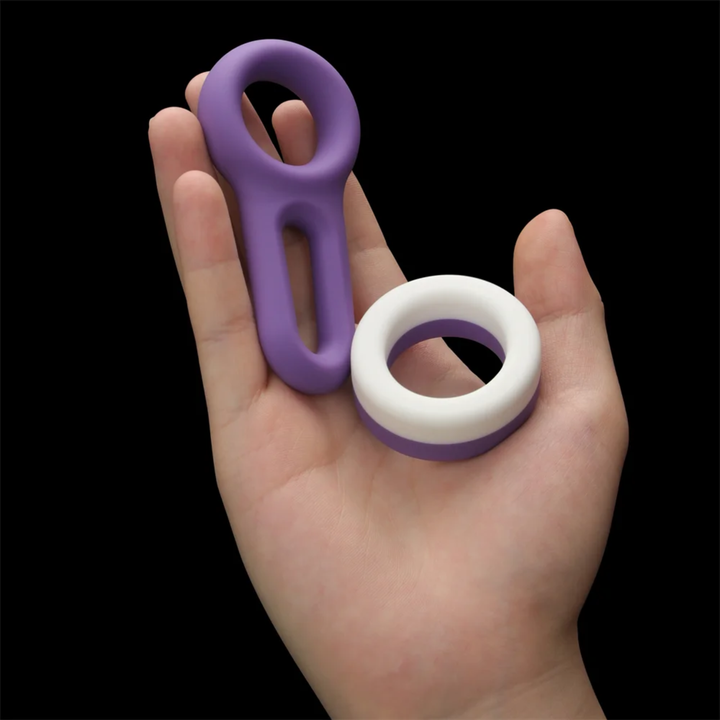 hand holding Pinnacle Pro Flex Duo Cock Ring