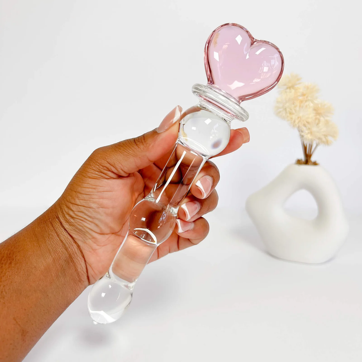 hand holding Heart Shape Crystal Massager wand dildo