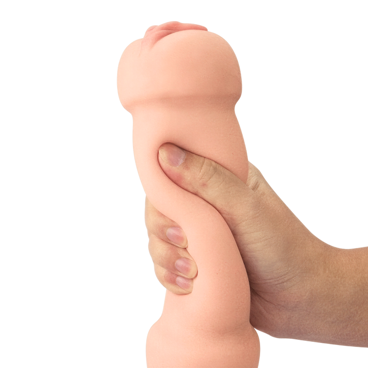 hand holding Realistic Double-Ended Stroker out of plastic case 