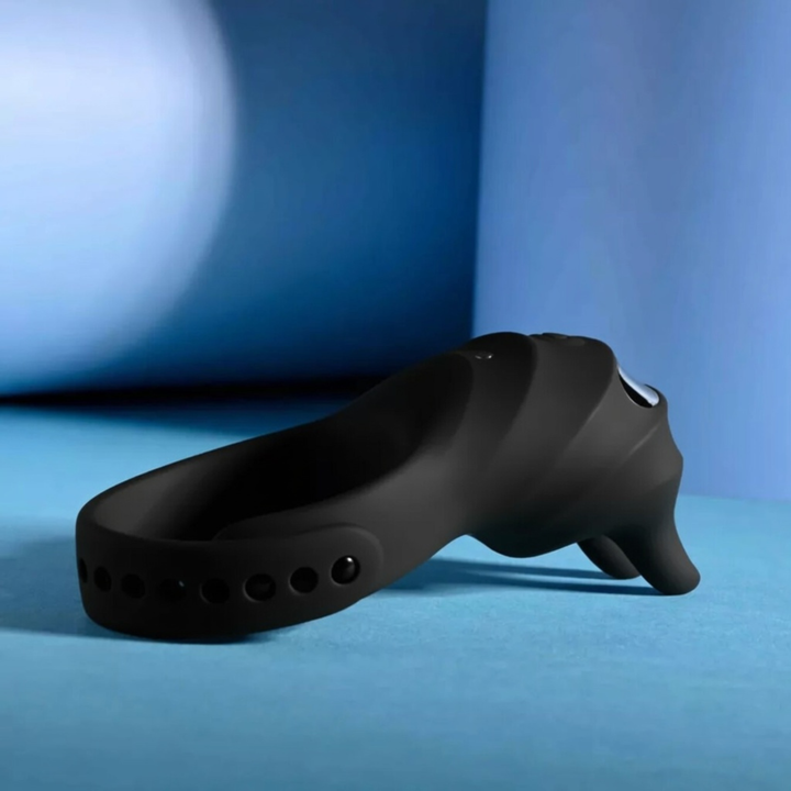 Adjustable Vibrating Couple's Cock Ring laying flat 