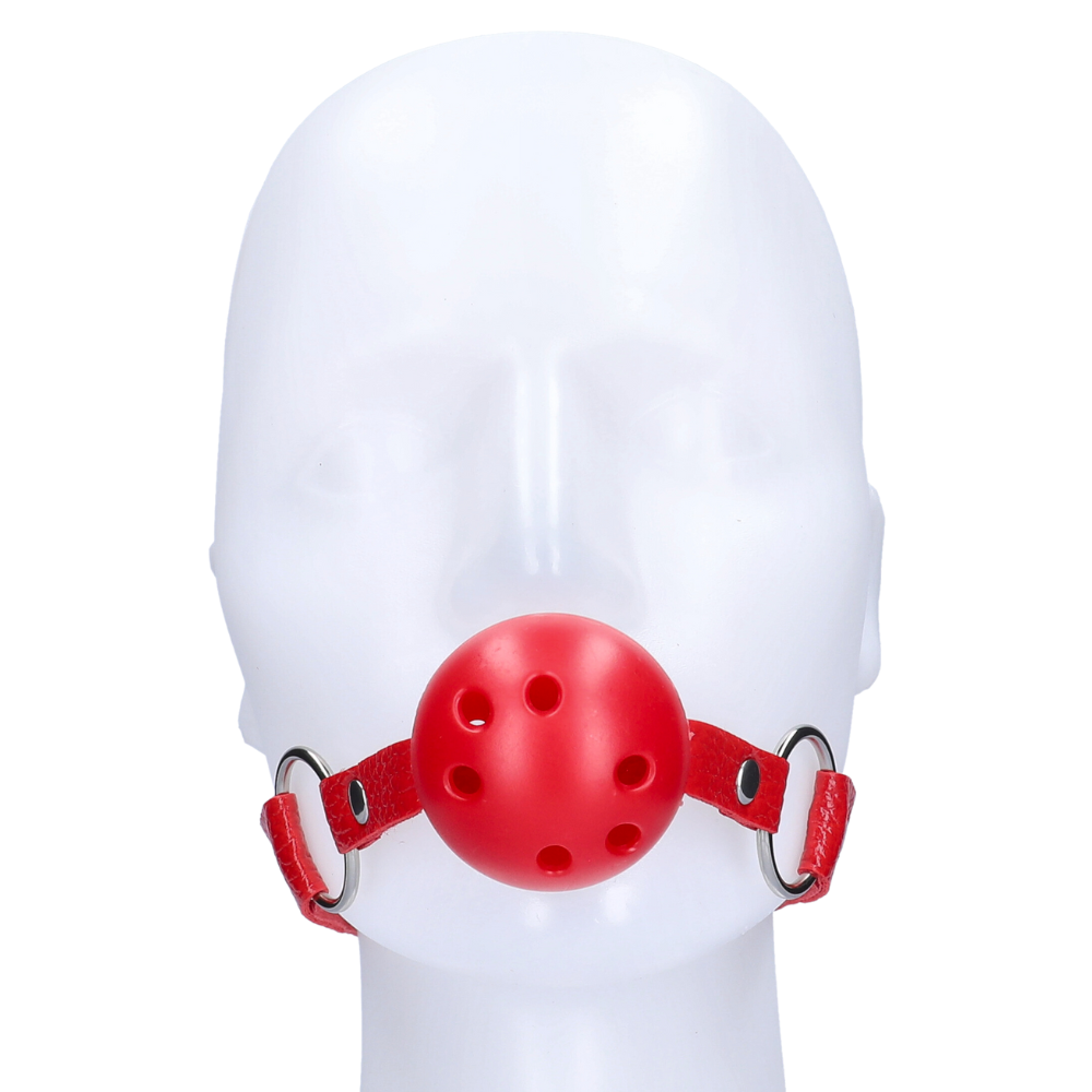 Red ball gag on a mannequin head