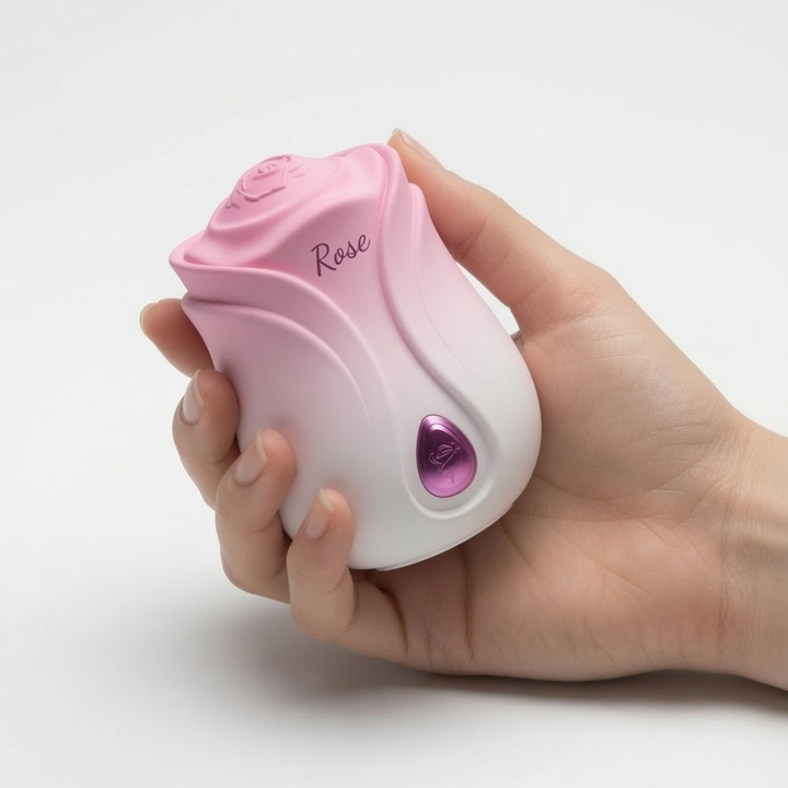 hand holding Rose-Shaped Tapping Clit Stimulator 