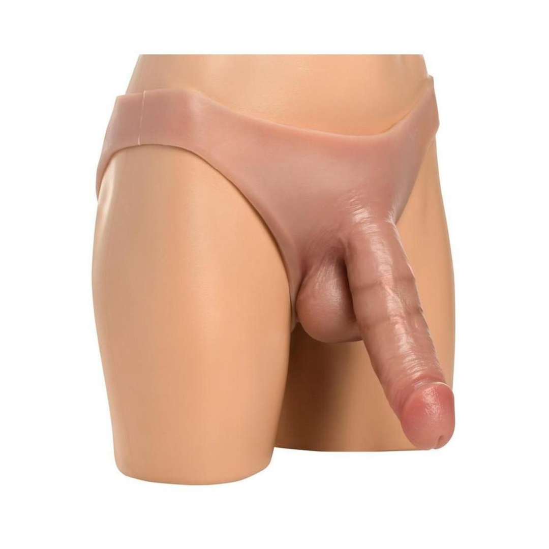 angled side view of XR Master Series 8 inch Thick Hollow Silicone Strap-On  on a mannequin 