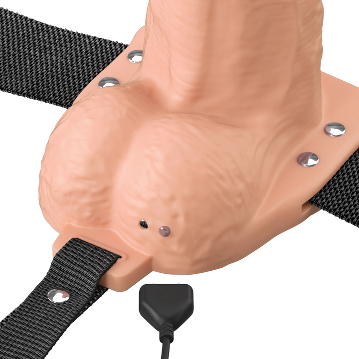 close up of magnetic charging base on Fantasy X-Tensions Elite Vibrating Rechargeable Silicone Dual Density Hollow Strap-On