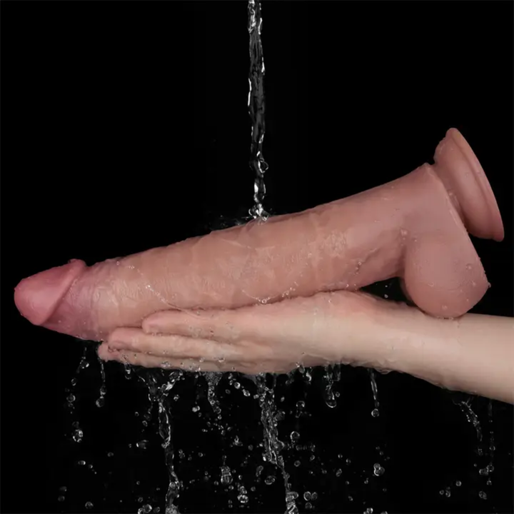 hand holding 12 inch Vibrating Dual Density Power Cock by LoveToy waterproof design 