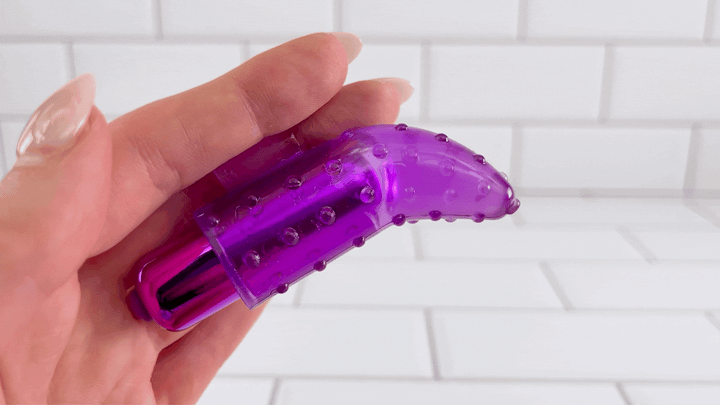 GIF of Frisky Finger on lowest settings held on fingers 