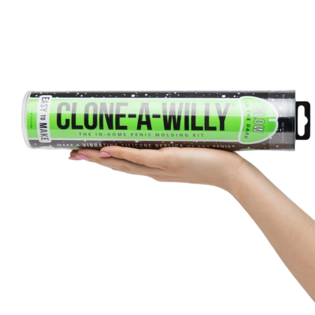 hand holding Glow In The Dark Clone-A-Willy Penis Molding Kit 