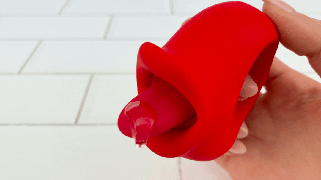 GIF of lubricant vibrating on tongue from Licking Vibrator on fastest speed 