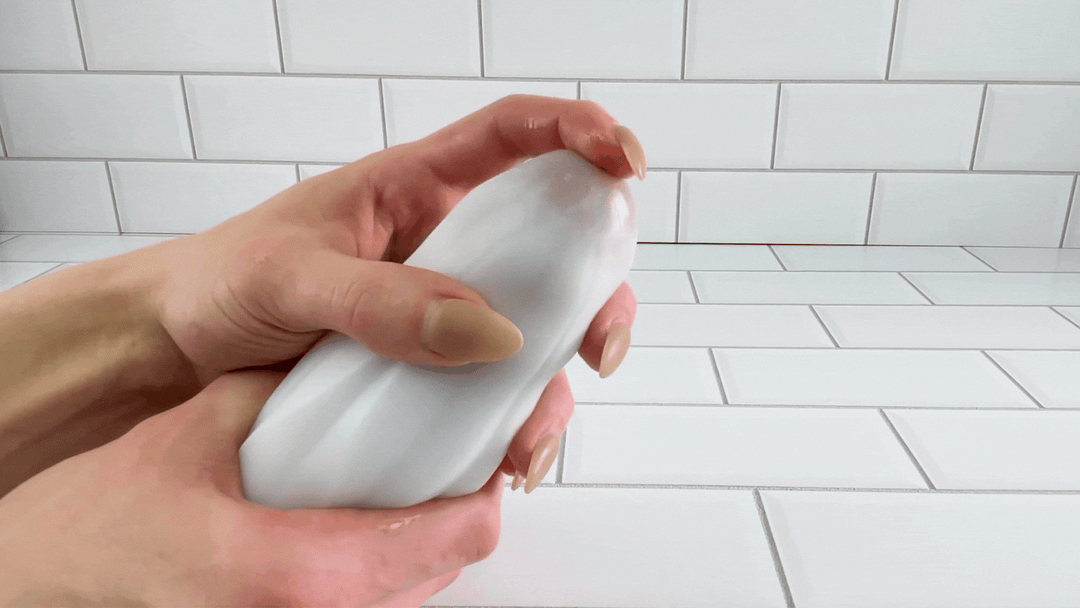 GIF of Cherry Blossom Masturbator Egg being teased on dildo tip to show the possibilities 