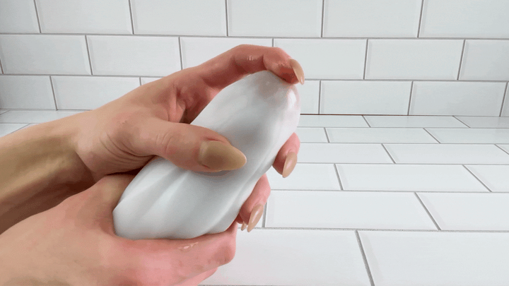 GIF of Cherry Blossom Masturbator Egg being teased on dildo tip to show the possibilities 