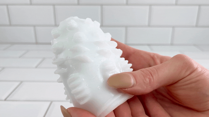 GIF of finger brushing against pleasure nubs from Cherry Blossom Masturbator Egg