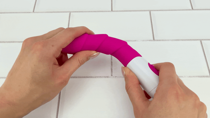 GIF of Rippled Silicone Vibrator For Beginners shaft being bent to show flexibility 
