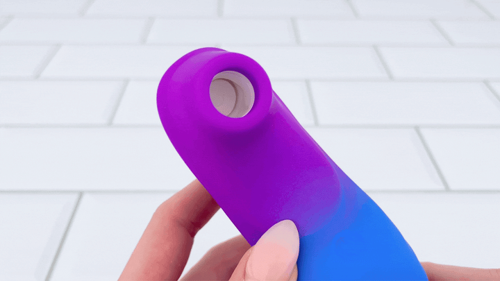 angled view of Aurora Rechargeable Air Pulse Clit Stimulator in motion 