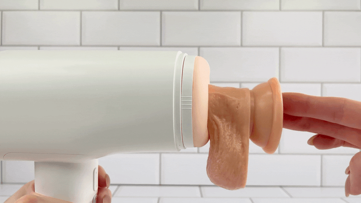 GIF of Super Series Pro Auto-Thrusting Masturbator with dildo being thrust inside 