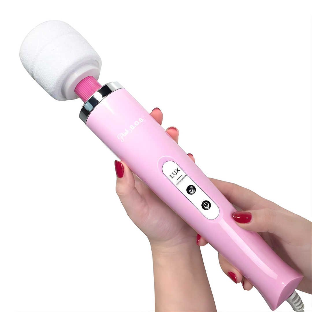 hands holding large plug in wand massager vibrator 