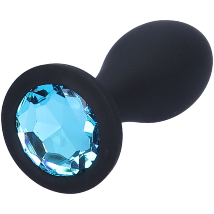 Close-up image of the blue jewel at the base of the anal plug.