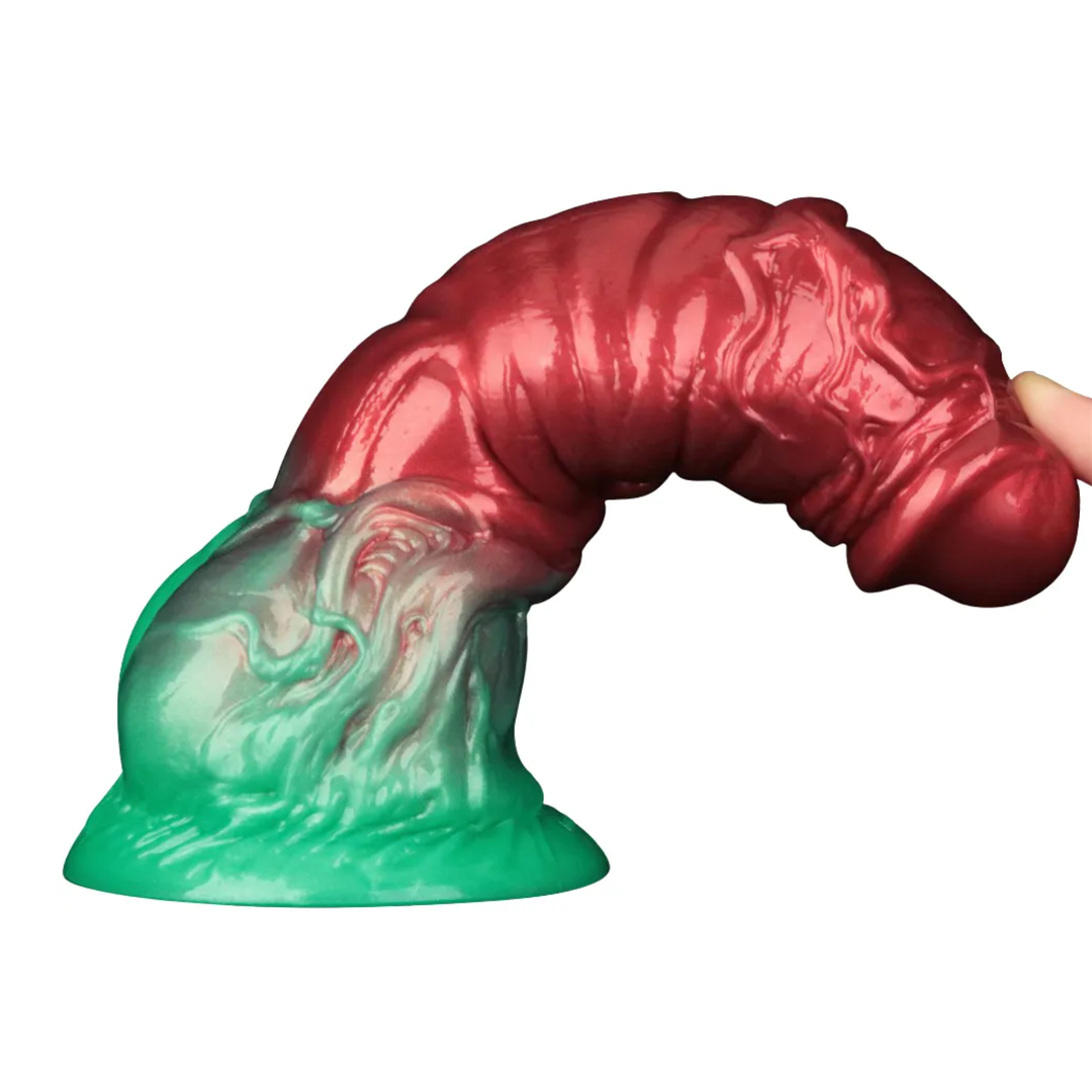 finger pushing down on tip from 7.5 inch Dual Density Silicone Inflatable Dildo to show flexibility 