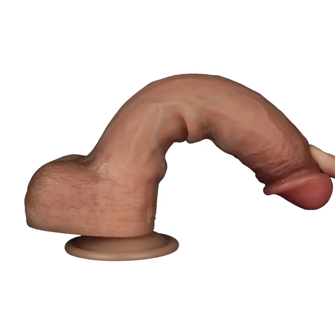finger pushing down head from 9 inch Sliding Skin Pro Dual Layer Silicone Dildo to show flexibility 